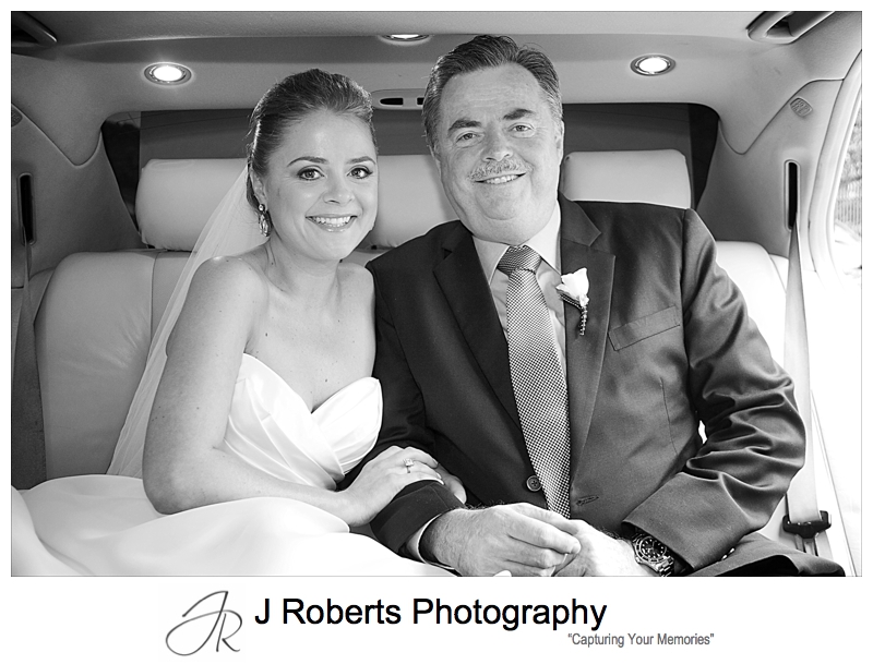 Bride and her father in the back of bridal car - wedding photography sydney